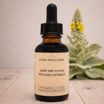 Bottle of Keha Wellness Mullein Extract on a wooden surface with a natural background
